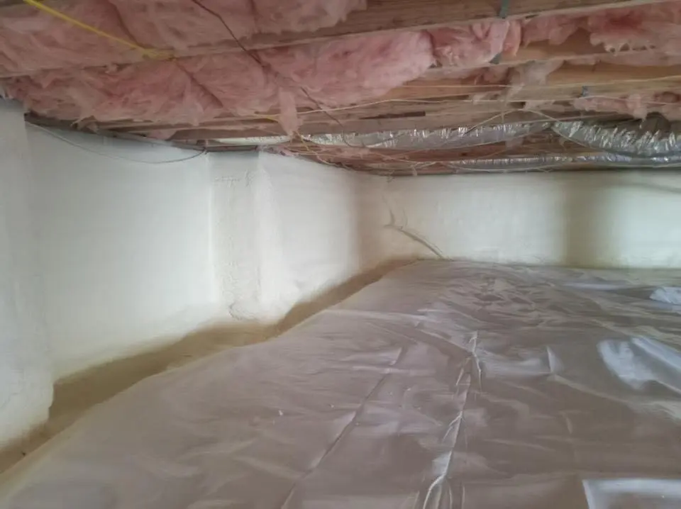 Crawl space encapsulation with closed-cell spray foam for Commercial Roof Restoration in Gardere